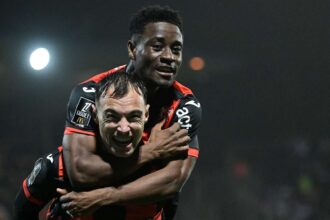 A Lorient megszabadult a Ligue 1 kiesesi zonajatol miutan szoros gyozelmet arattak a 10 fos Lyon felett